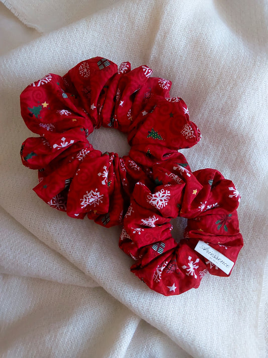 front view of Christmas red cotton upcycled scrunchies laying down size comparison