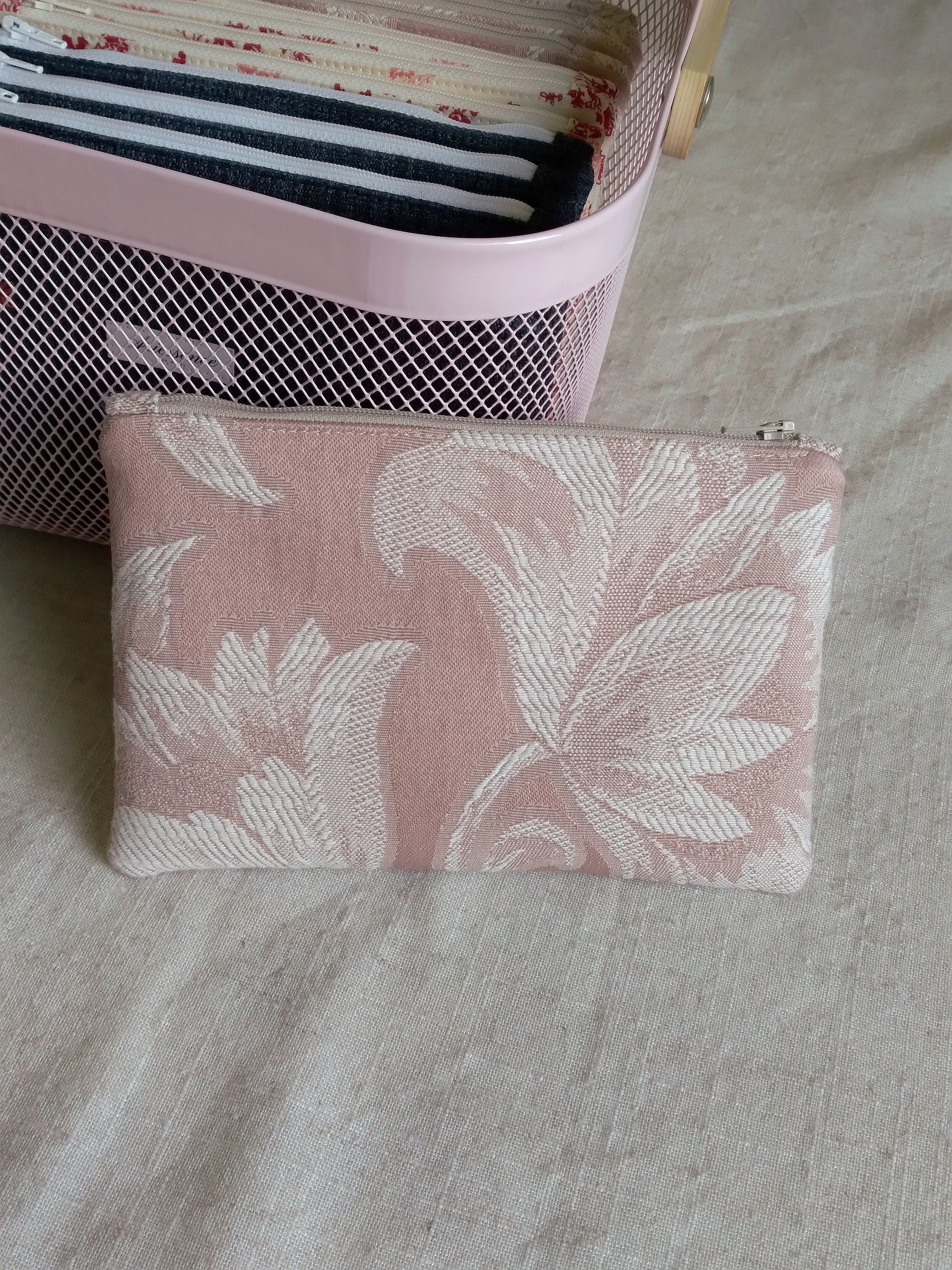 back view of floral pink jacquard pouch