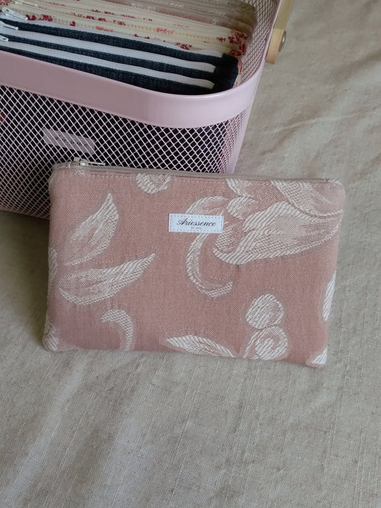 front view of floral pink jacquard pouch