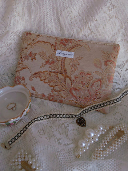 front view of gold jacquard upcycled pouch