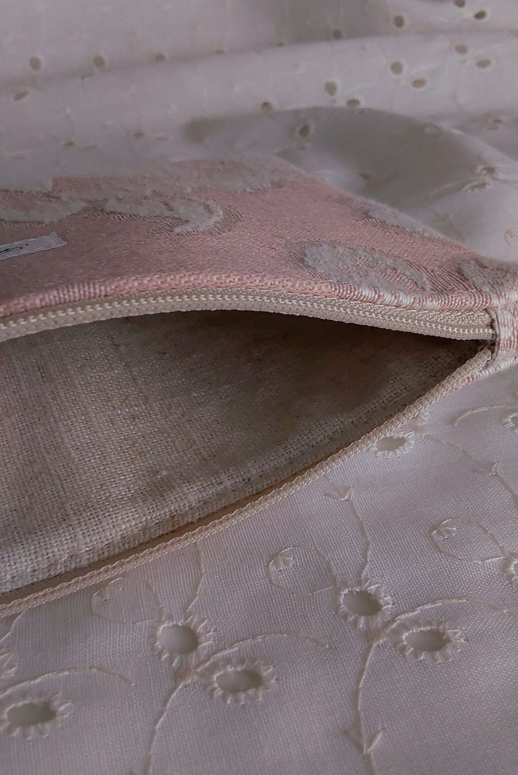 inside view of floral pink jacquard pouch