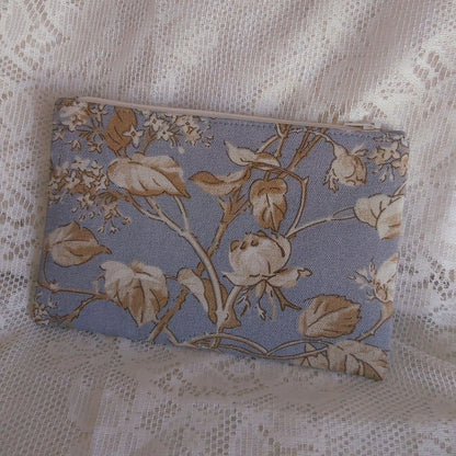 back view of floral blue beige upcycled pouch